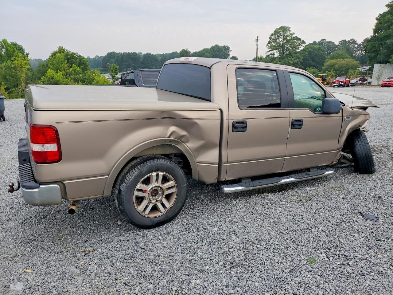2005 Ford F150 Supercrew Gold vin: 1FTPW12505KC62110