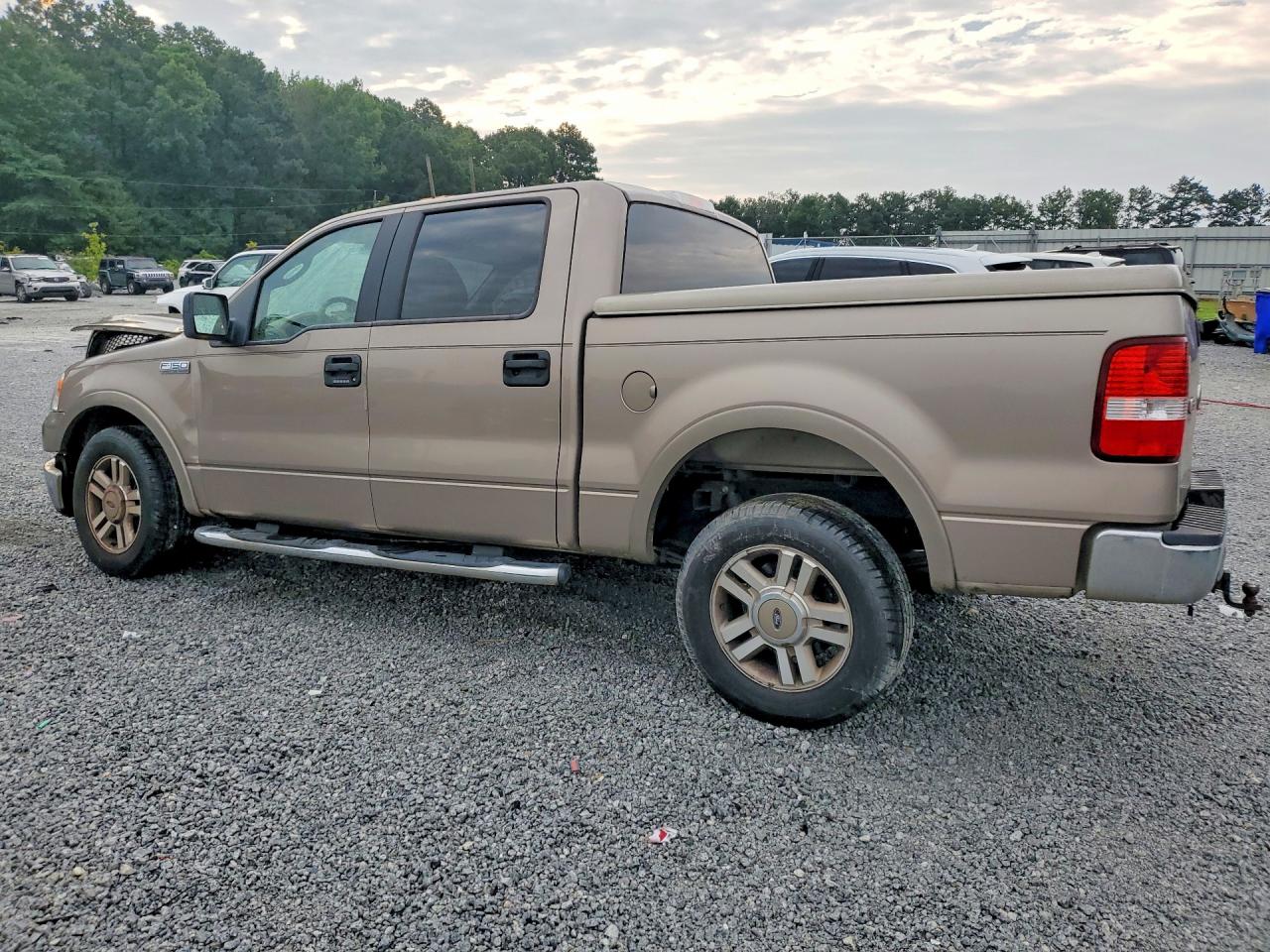 2005 Ford F150 Supercrew Gold vin: 1FTPW12505KC62110