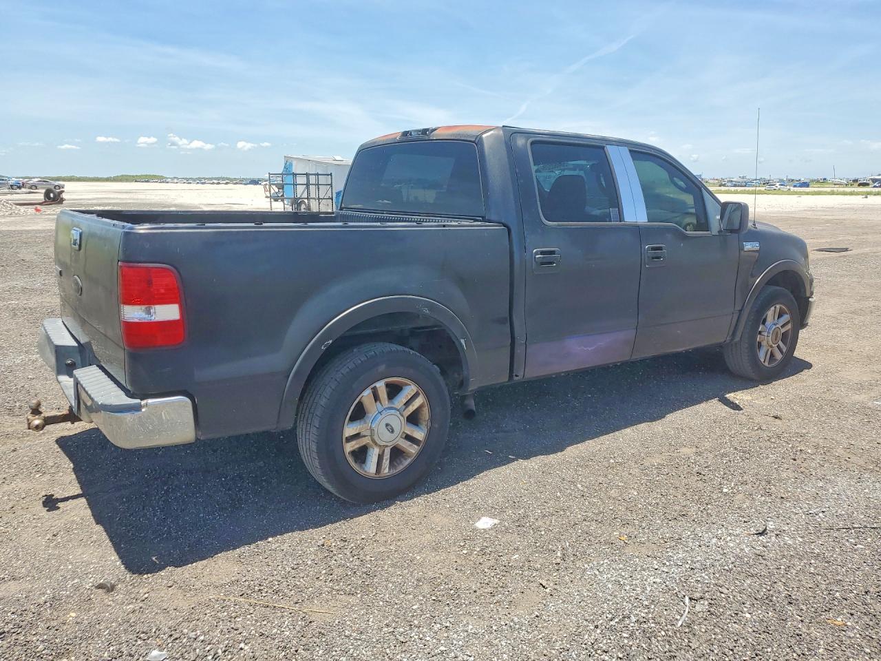 2004 Ford F150 Super Black vin: 1FTPW12574KD91461