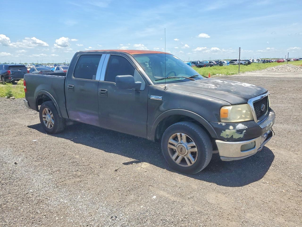 2004 Ford F150 Super Black vin: 1FTPW12574KD91461