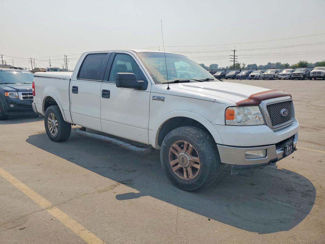 2005 Ford F150 Supercrew White vin: 1FTPW14545KC55559