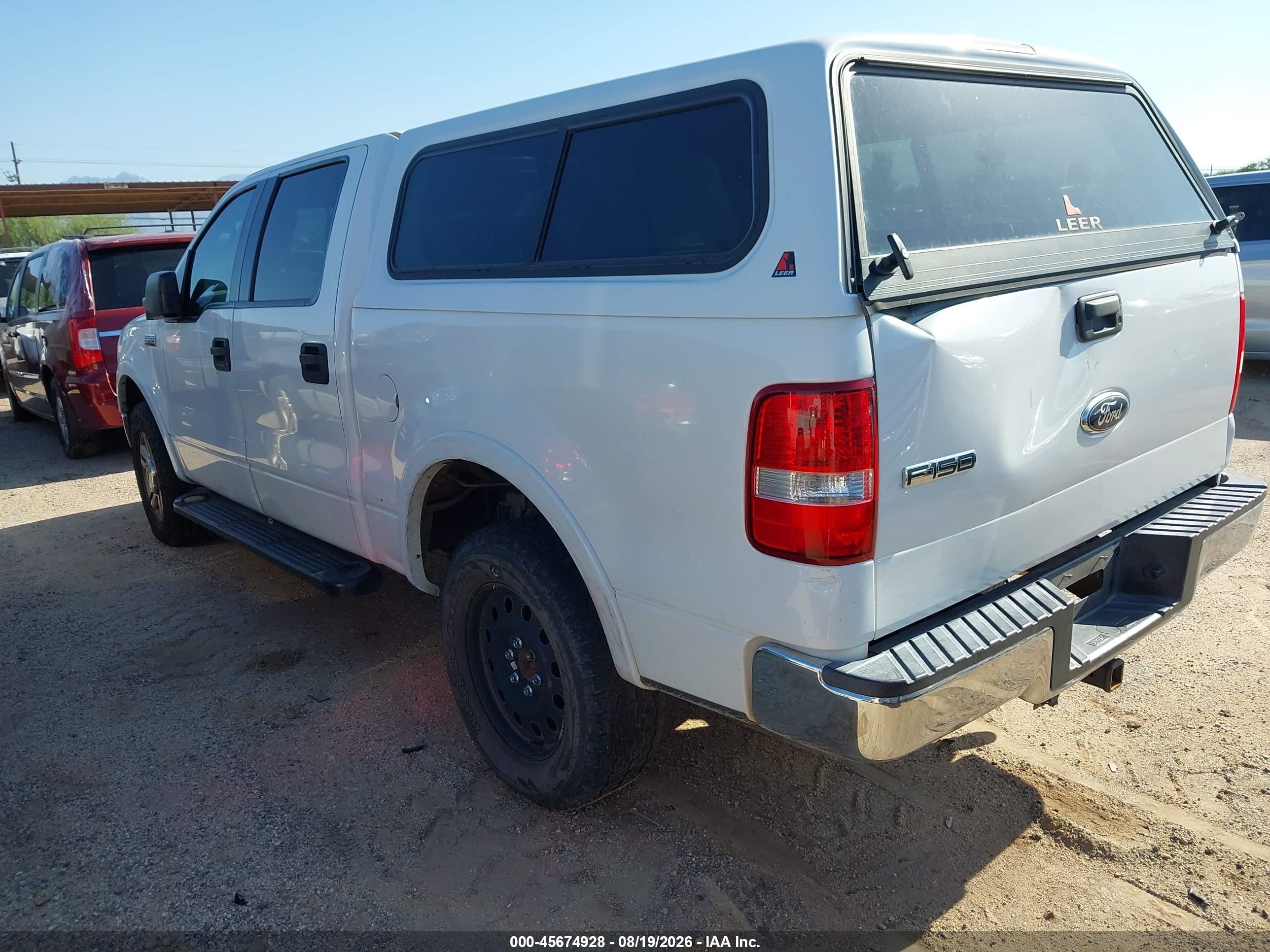 2004 Ford F-150   White vin: 1FTPW14554KB70552