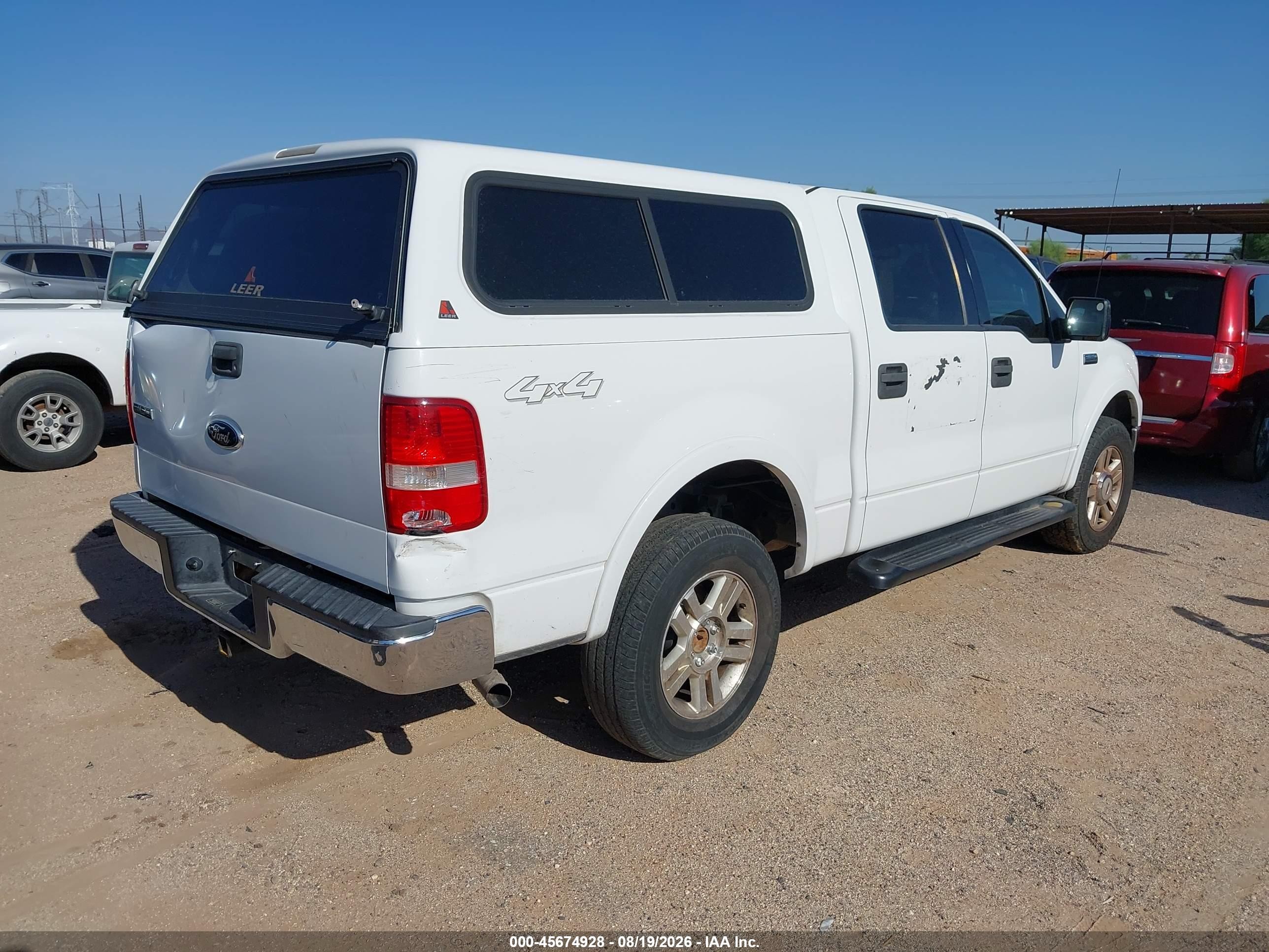 2004 Ford F-150   White vin: 1FTPW14554KB70552