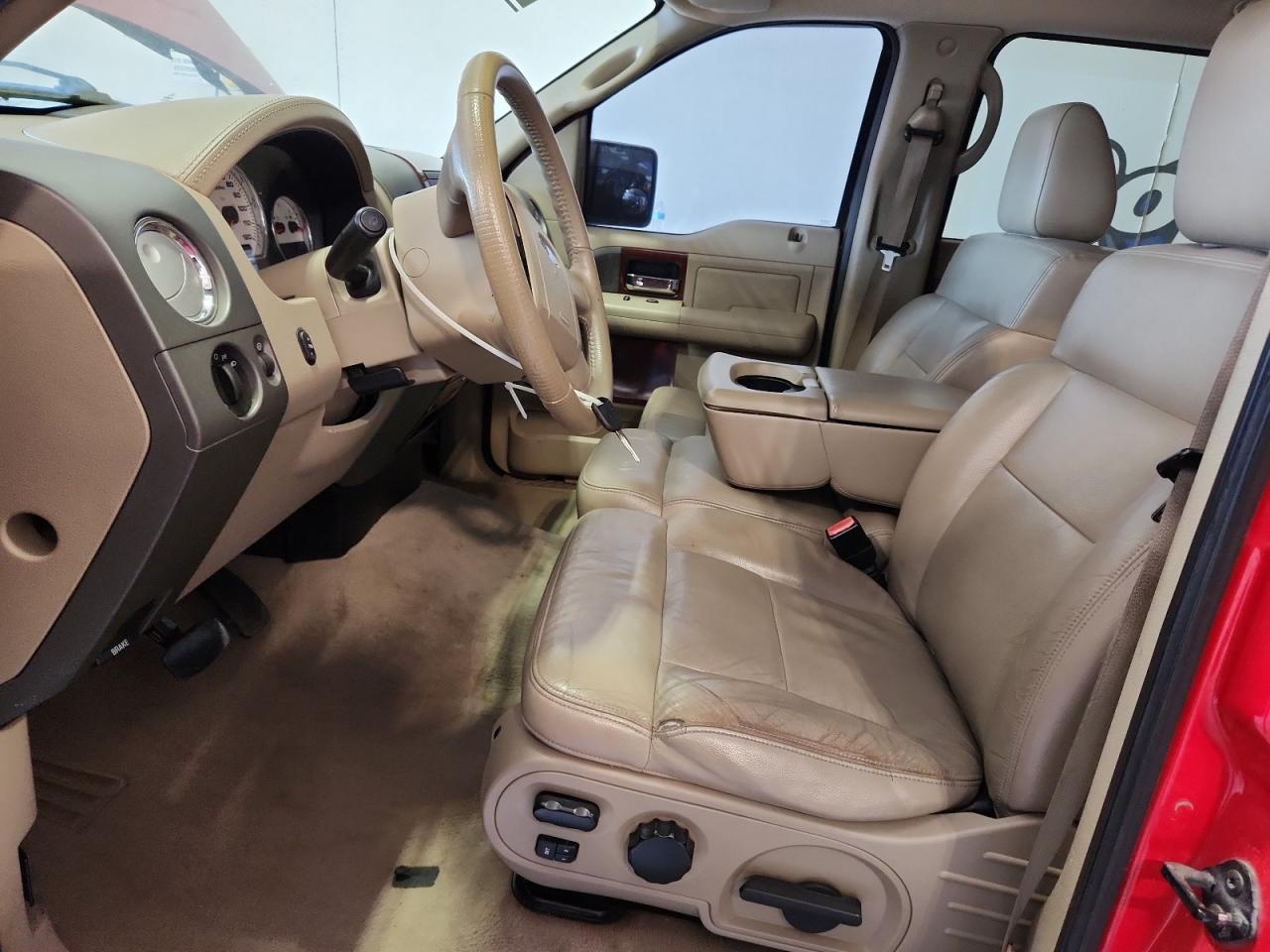 2005 Ford F150 Supercrew Red vin: 1FTPW14575FB06149 Damage: Left Front Seat Cushion, Torn, 5 To 6 Inches