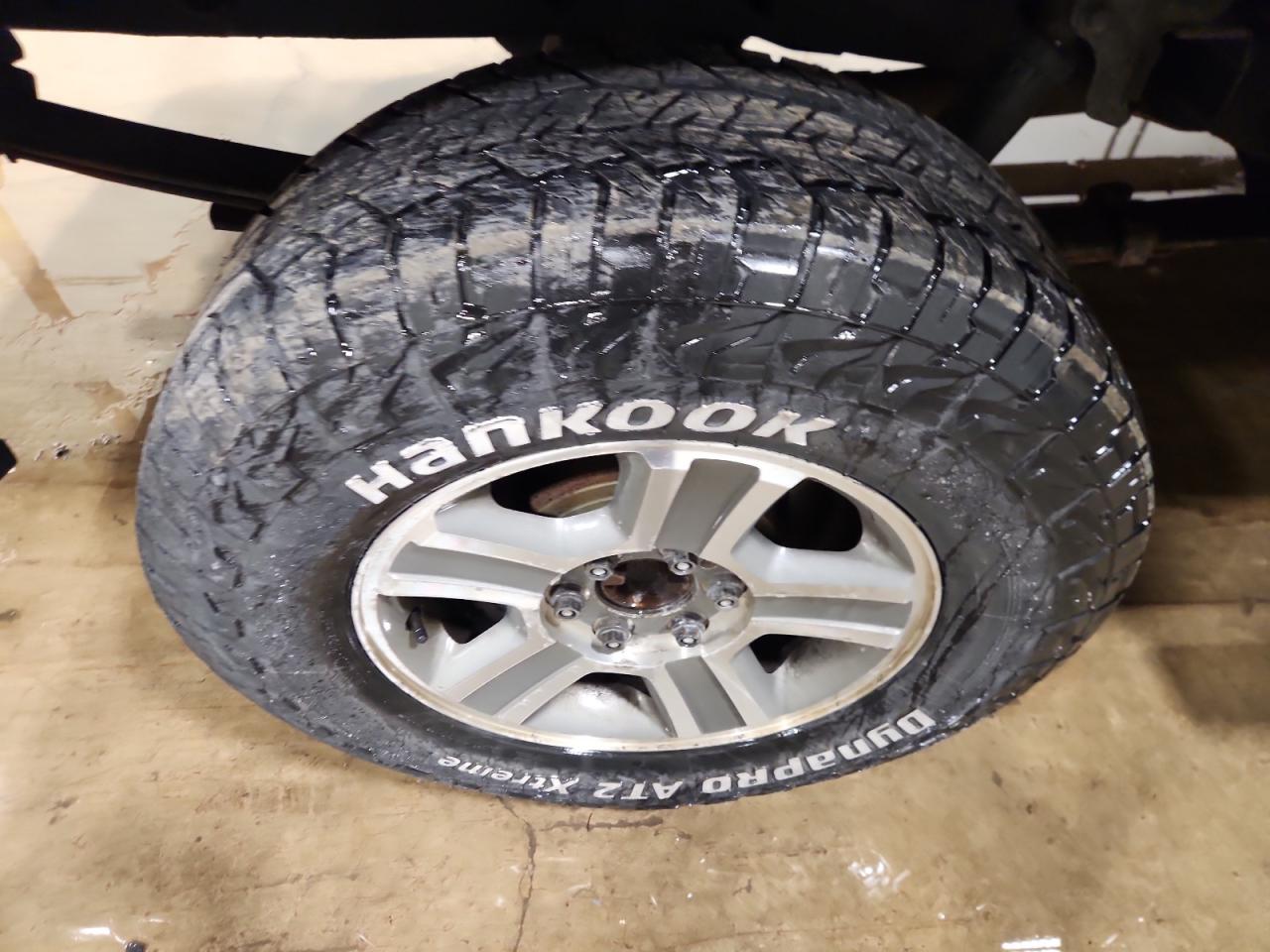 2006 Ford F150 Supercrew Black vin: 1FTPW14596KC60693 Damage: Right Rear Center Cap, Missing, Replacement Required