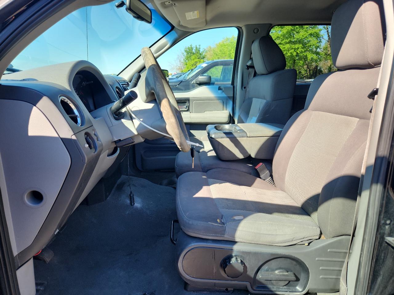 2006 Ford F150 Supercrew Black vin: 1FTPW14596KC60693 Damage: Steering Wheel, Worn, Acceptable