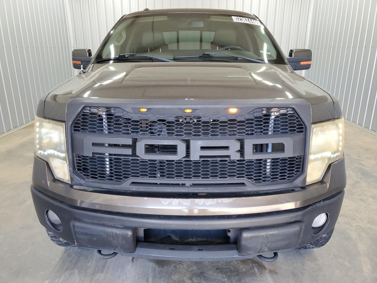 2009 Ford F150 Supercrew Brown vin: 1FTPW14V39FA95107 Damage: Front Bumper, Dent(S) W/No Paint Dmg, 5 To 6 Inches
