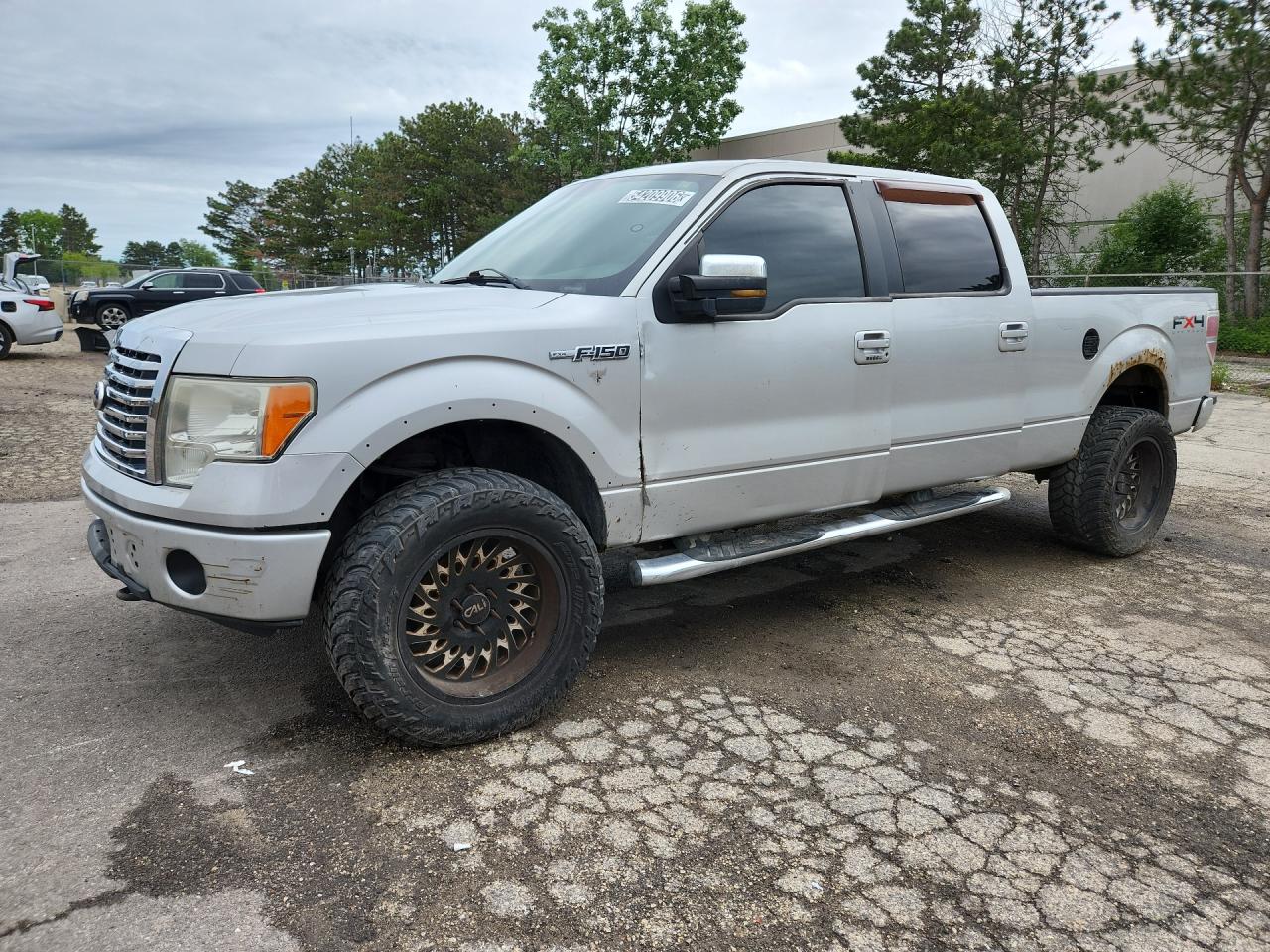 2009 Ford F150 Supercrew Silver vin: 1FTPW14VX9FA09517 Damage: Left Front Wheel, Aftermarket, Acceptable
