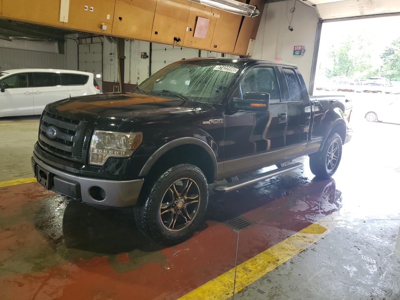 2009 Ford F150 Super Cab Black vin: 1FTPX04VX9KC43669 Damage: Left Front Wheel, Aftermarket, Acceptable