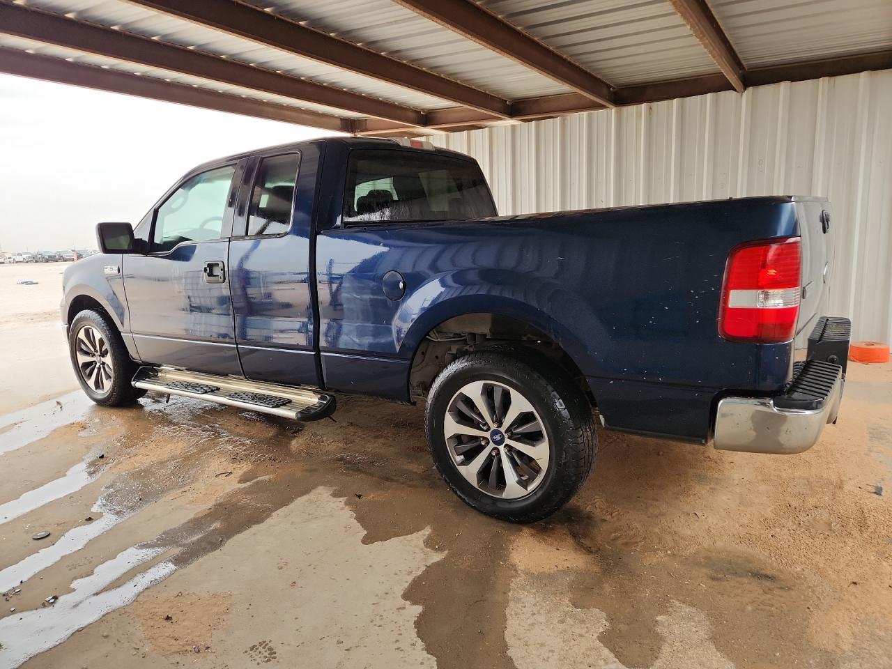 2005 Ford F150 Blue vin: 1FTPX12535FA17727 Damage: Left Front Door, Dent(S) W/ Paint Dmg, 2 To 3 Inches