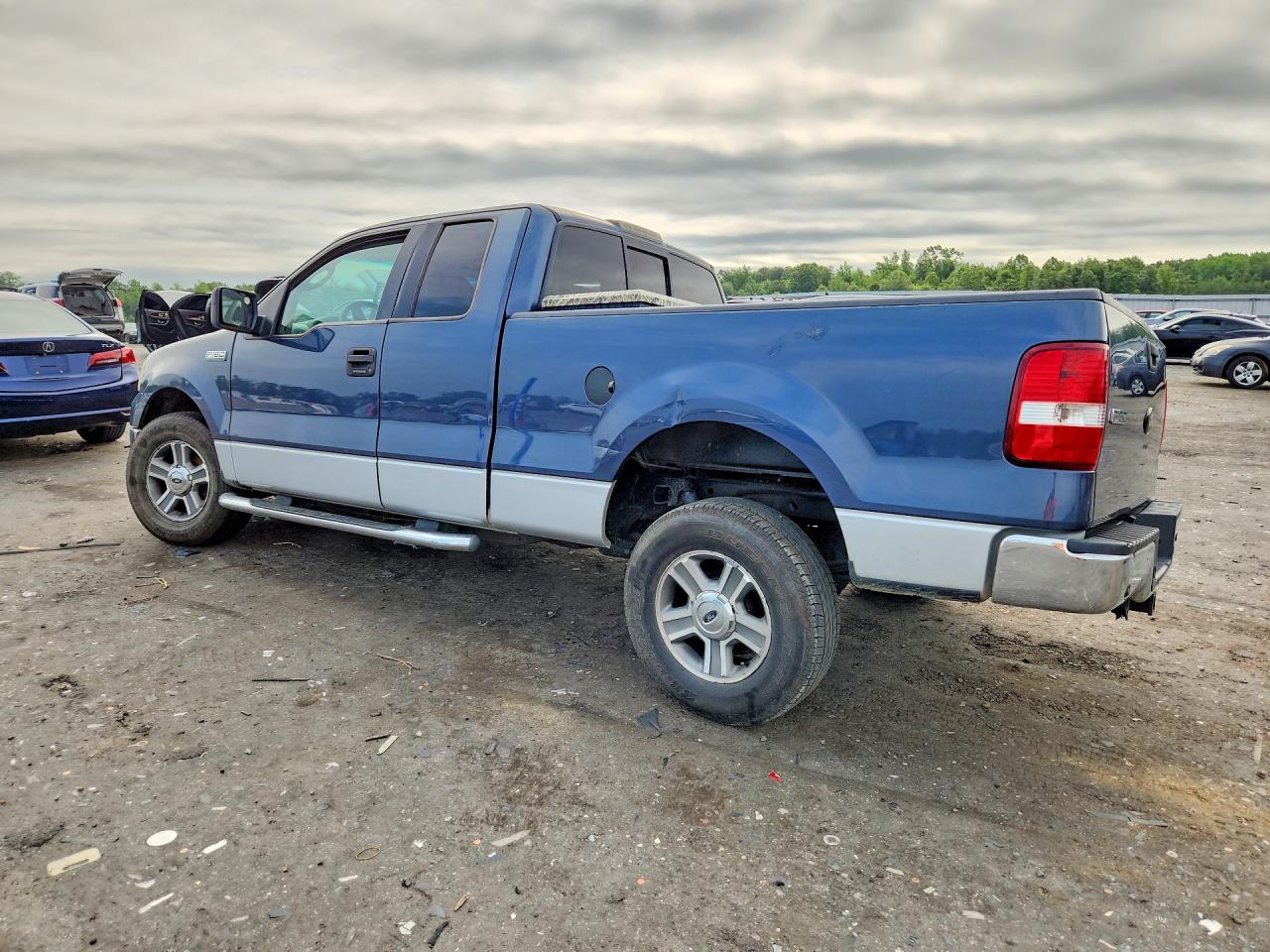 2005 Ford F150 Blue vin: 1FTPX12555NB53864