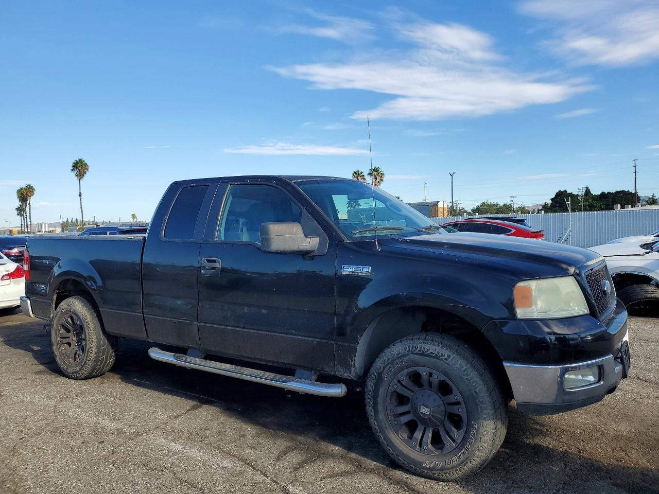 2005 Ford F150 Black vin: 1FTPX125X5NA91541