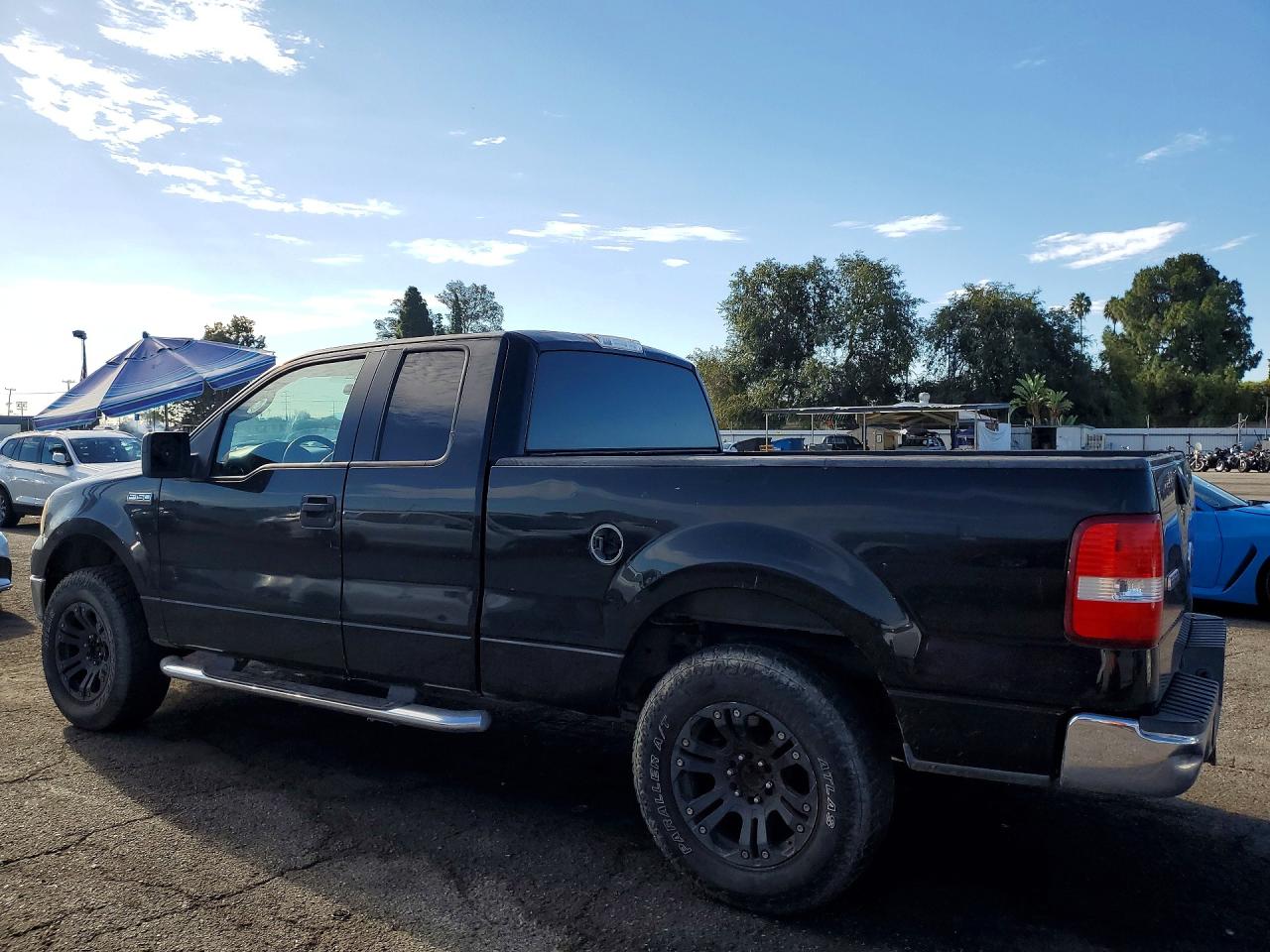 2005 Ford F150 Black vin: 1FTPX125X5NA91541