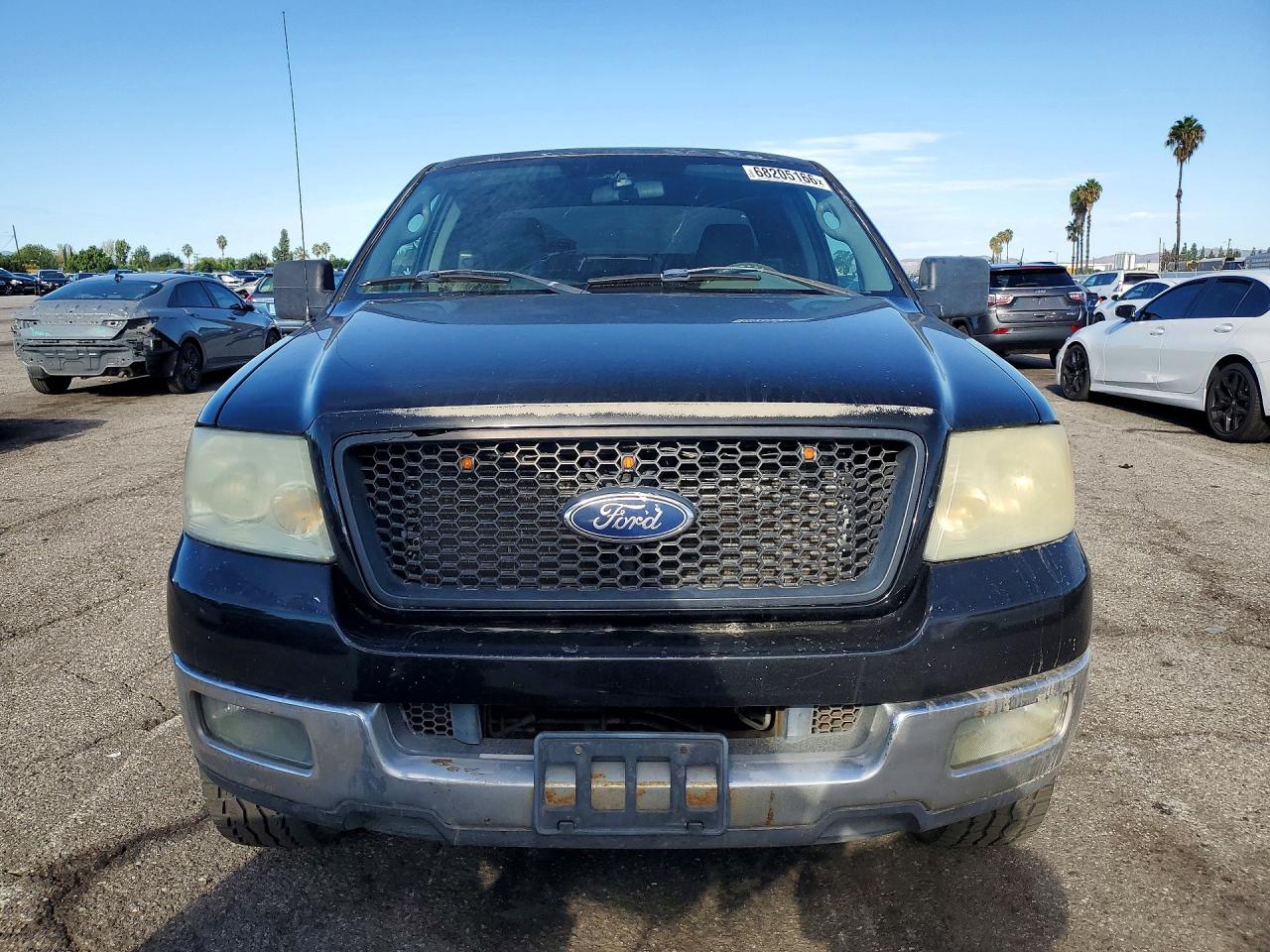 2005 Ford F150 Black vin: 1FTPX125X5NA91541