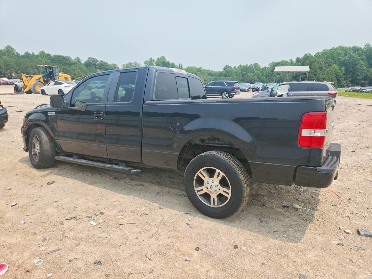 2007 Ford F150 Black vin: 1FTPX12V67KC10898