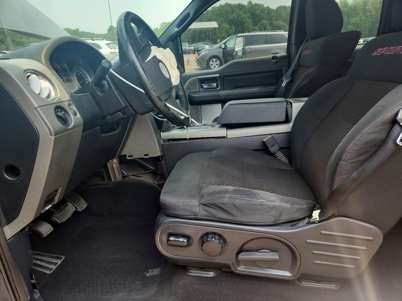 2007 Ford F150 Black vin: 1FTPX12V67KC10898