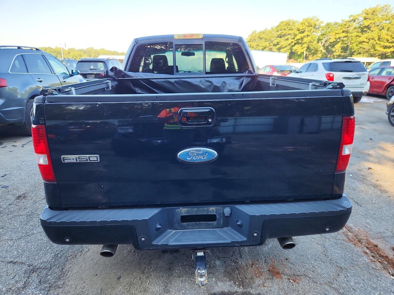 2007 Ford F150 Black vin: 1FTPX12V87KC13401
