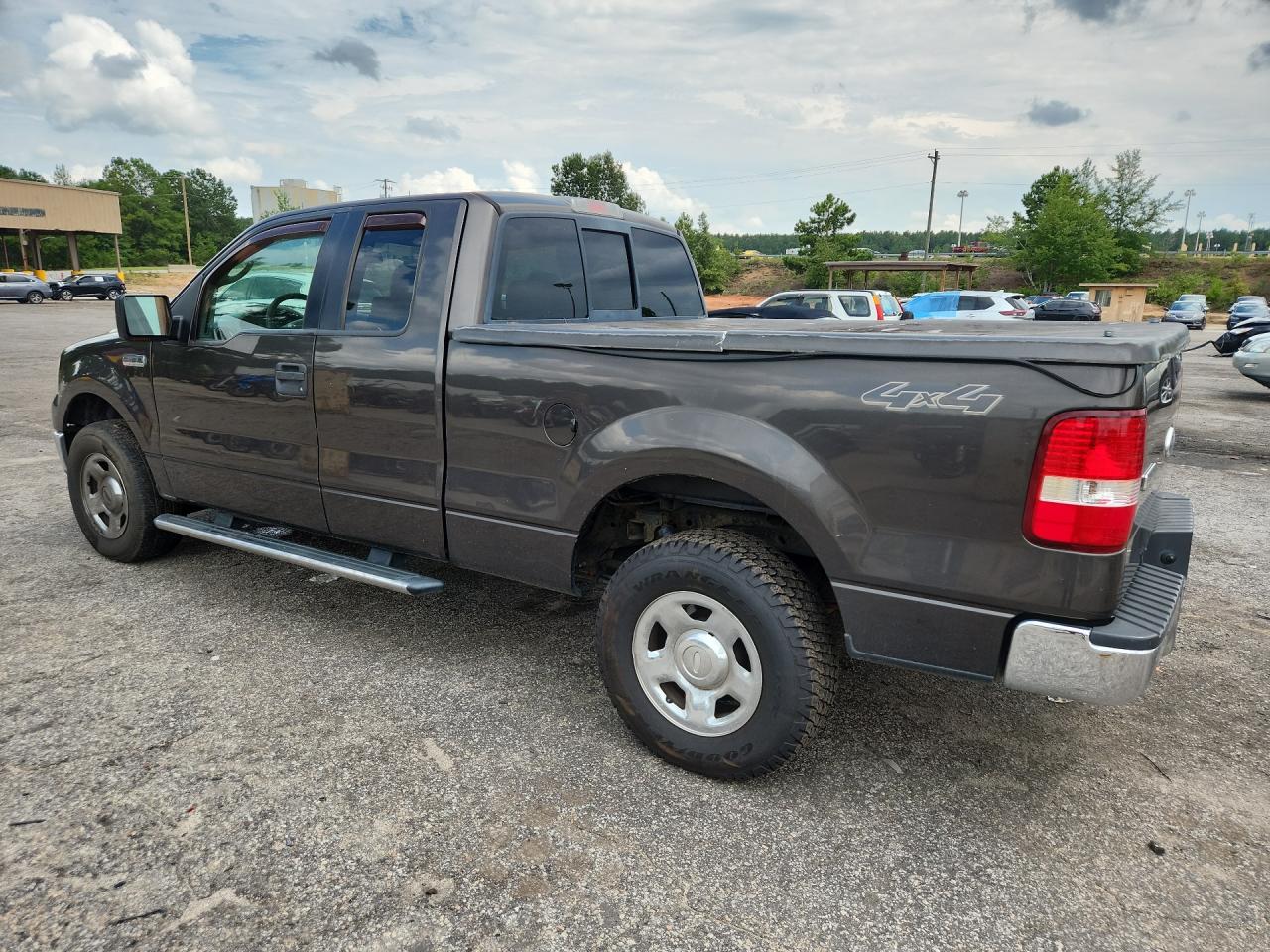 2006 Ford F150 Brown vin: 1FTPX14536FA34509 Damage: Tonneau Cover, Broken, Replacement Required