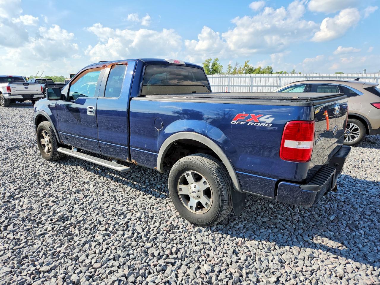 2005 Ford F150 Blue vin: 1FTPX14545NB06595