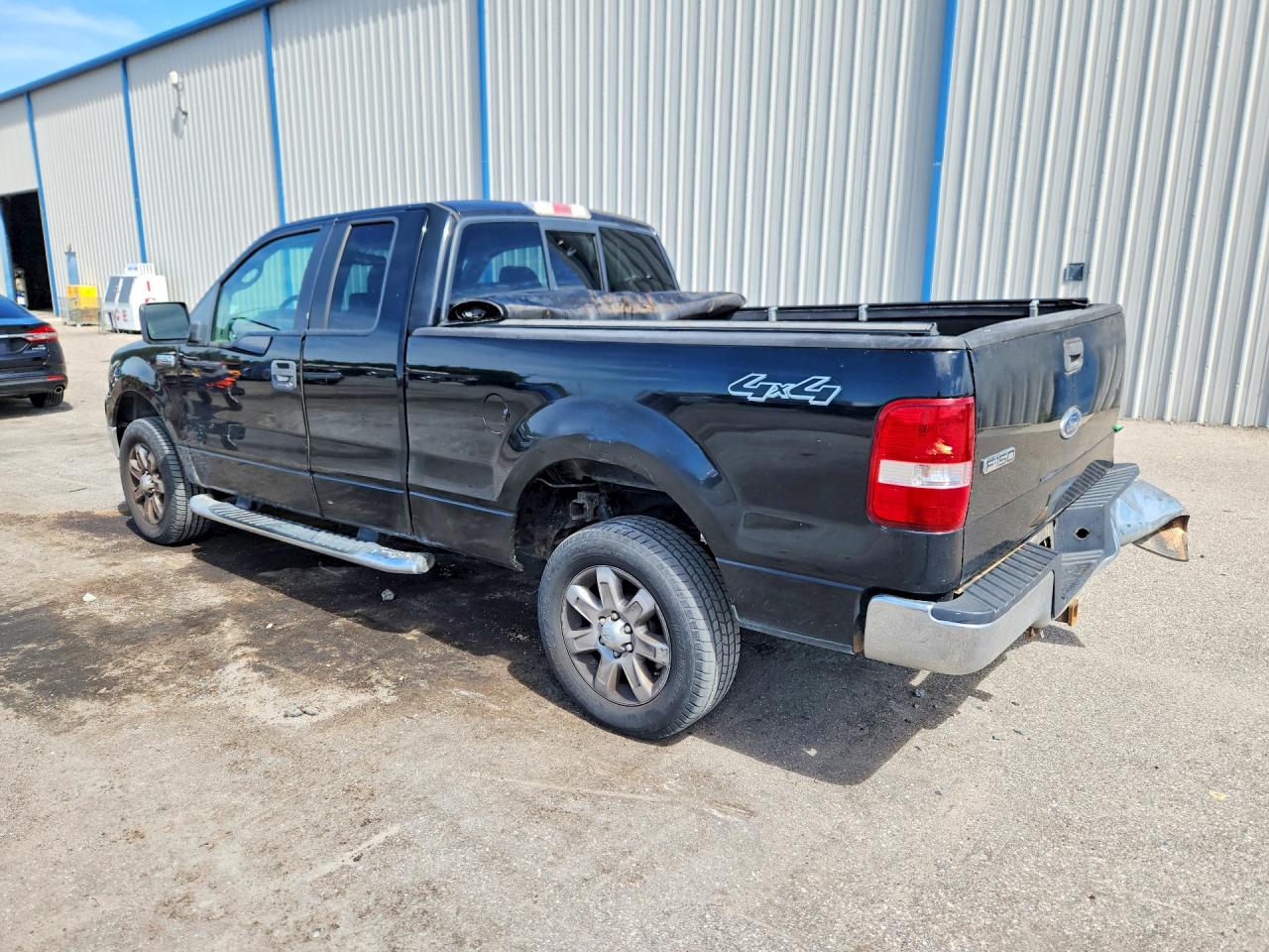 2005 Ford F150 Black vin: 1FTPX14575FA90306