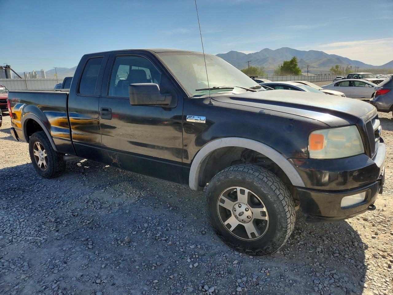 2005 Ford F150 Black vin: 1FTPX14575NB51076