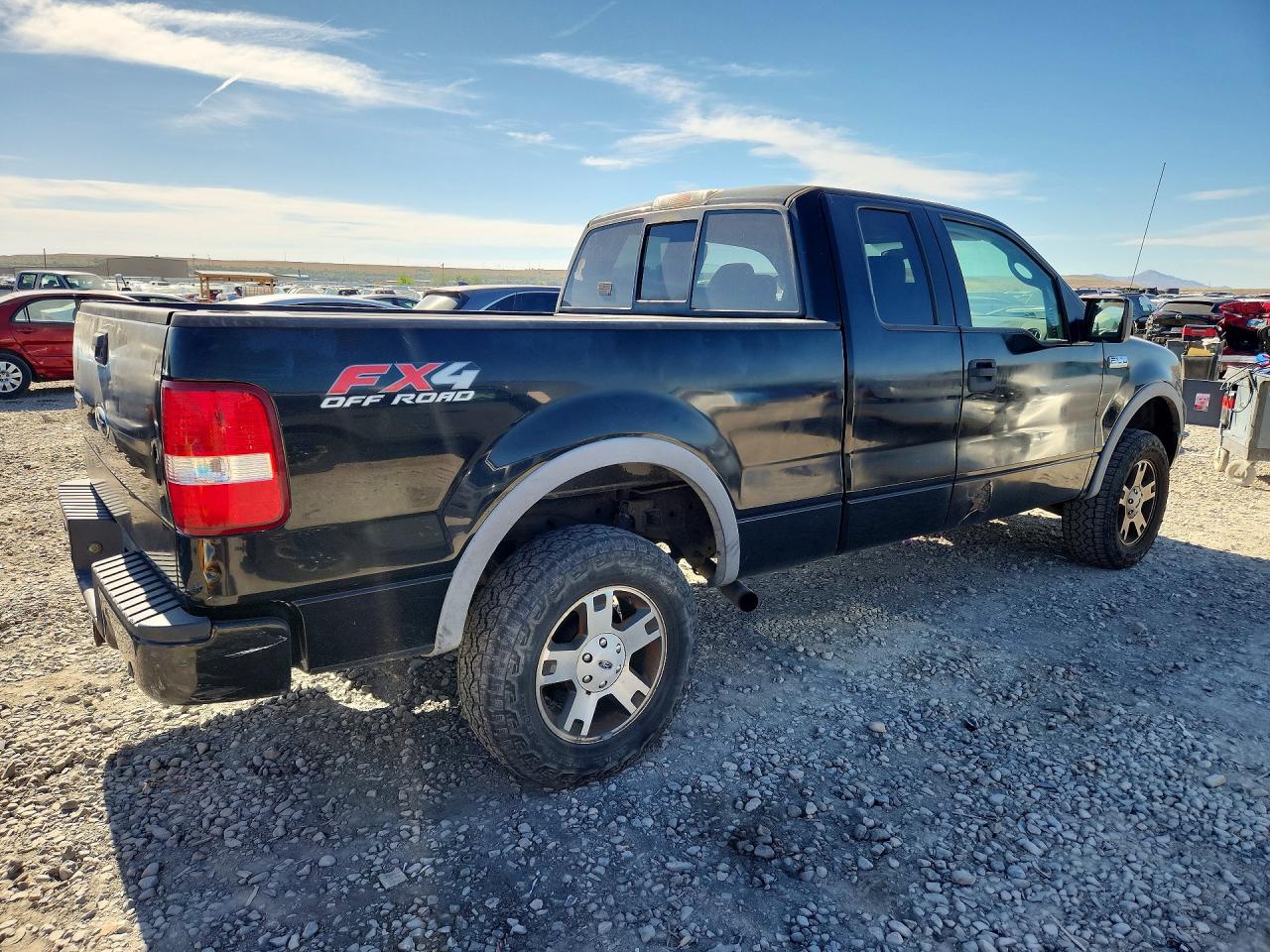 2005 Ford F150 Black vin: 1FTPX14575NB51076