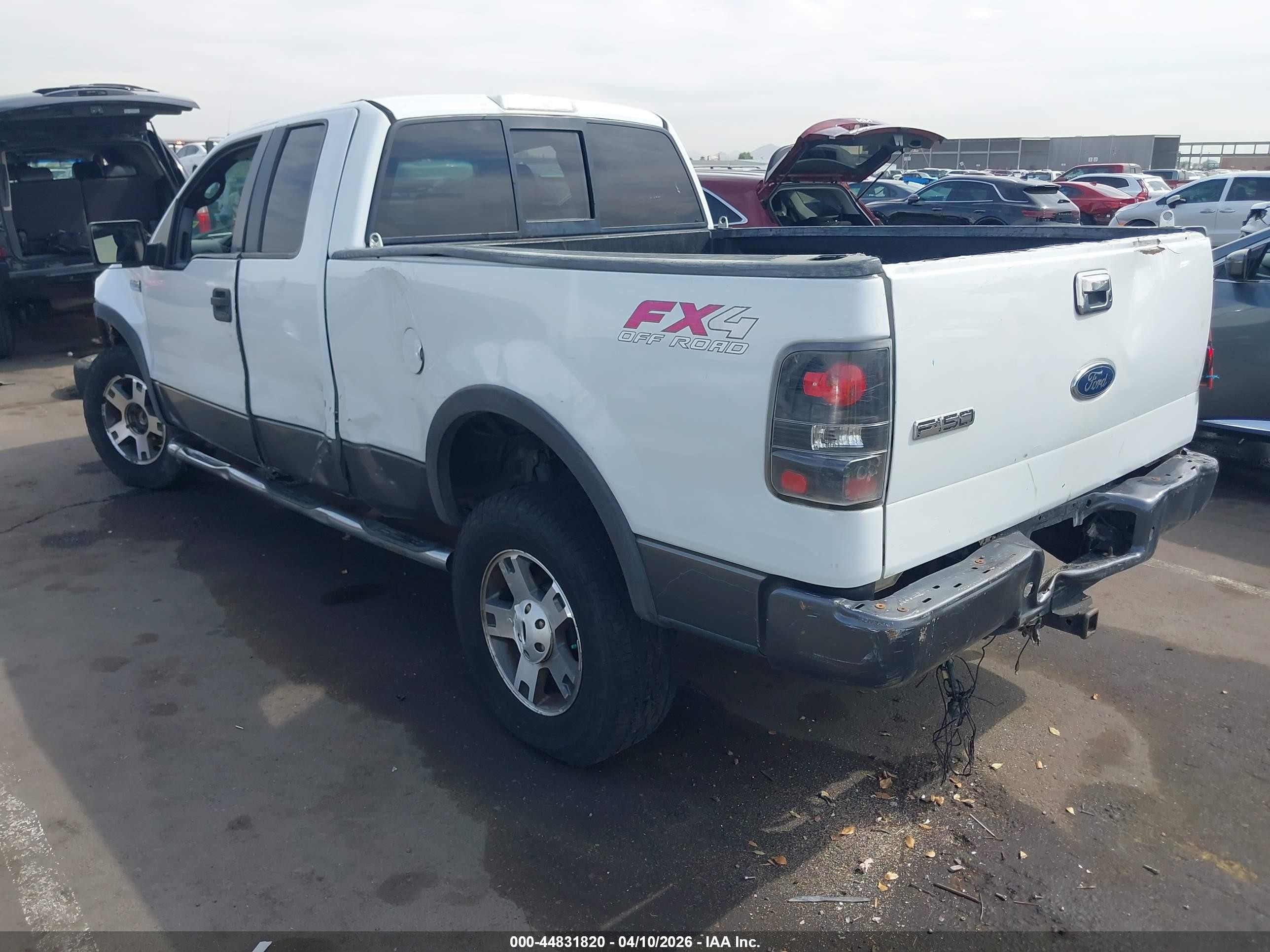 2004 Ford F150   White vin: 1FTPX14584NC28861