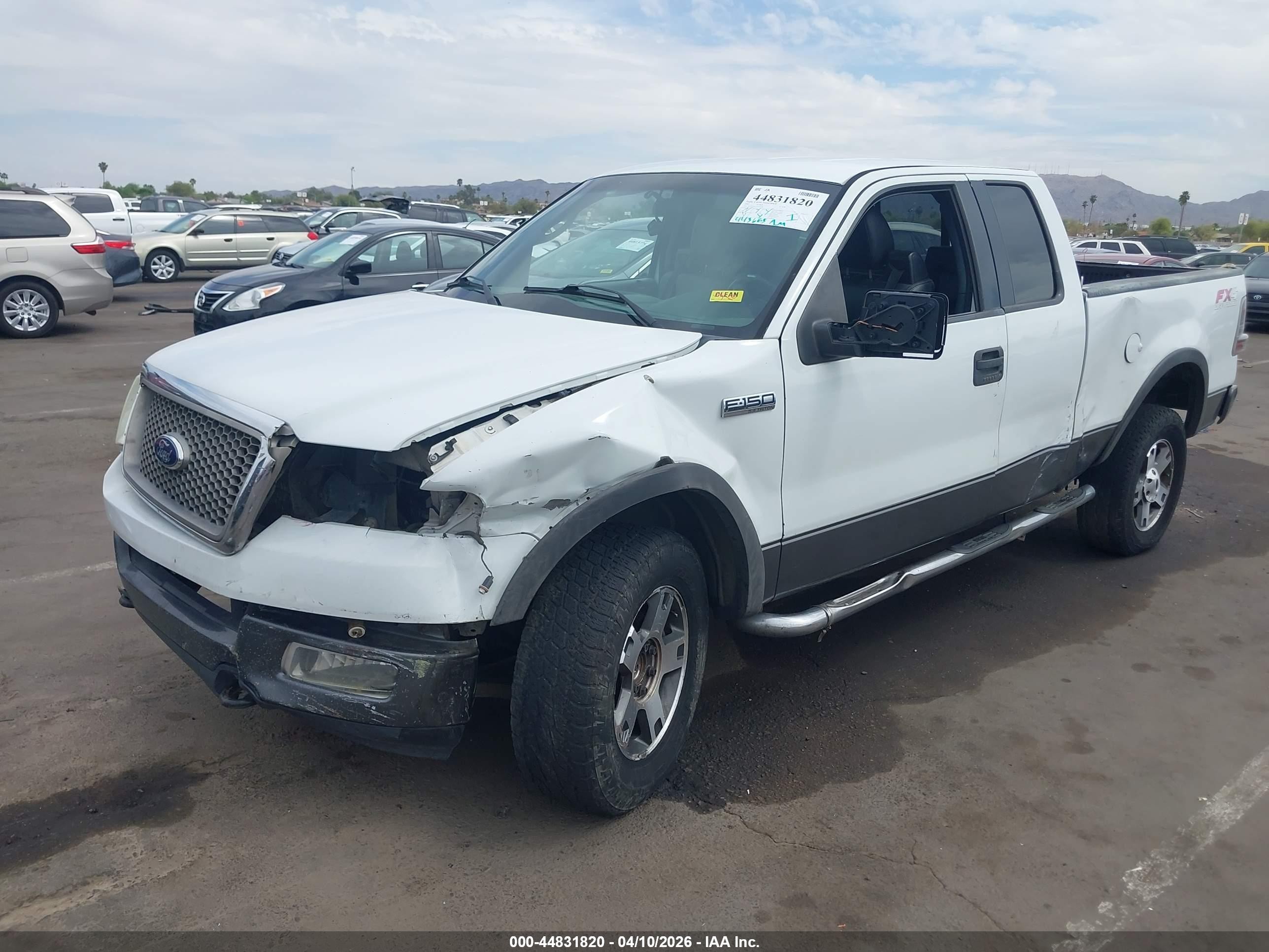2004 Ford F150   White vin: 1FTPX14584NC28861