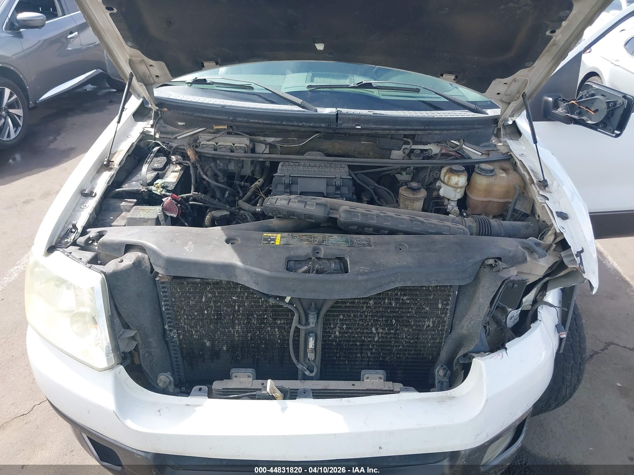 2004 Ford F150   White vin: 1FTPX14584NC28861