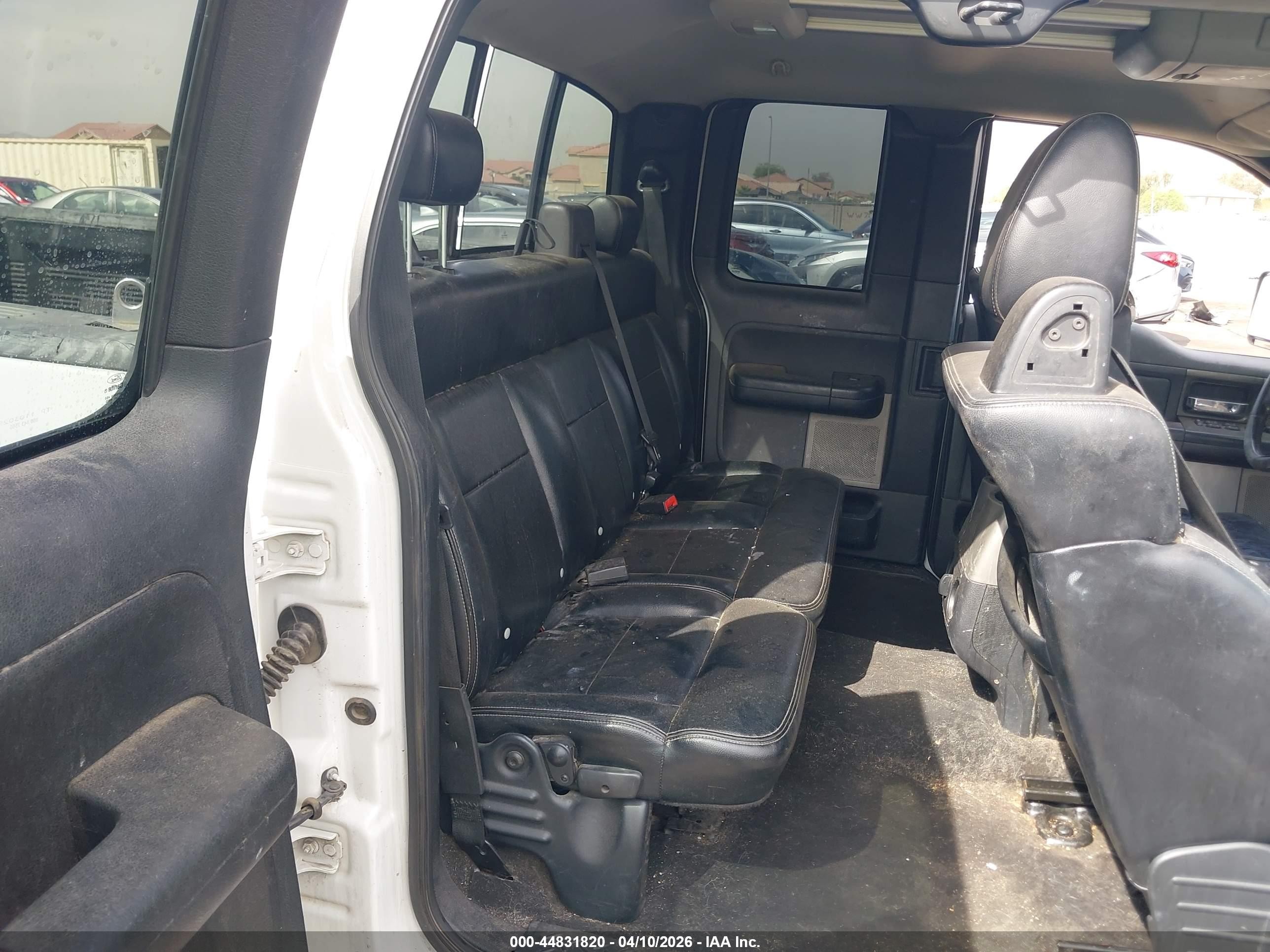 2004 Ford F150   White vin: 1FTPX14584NC28861