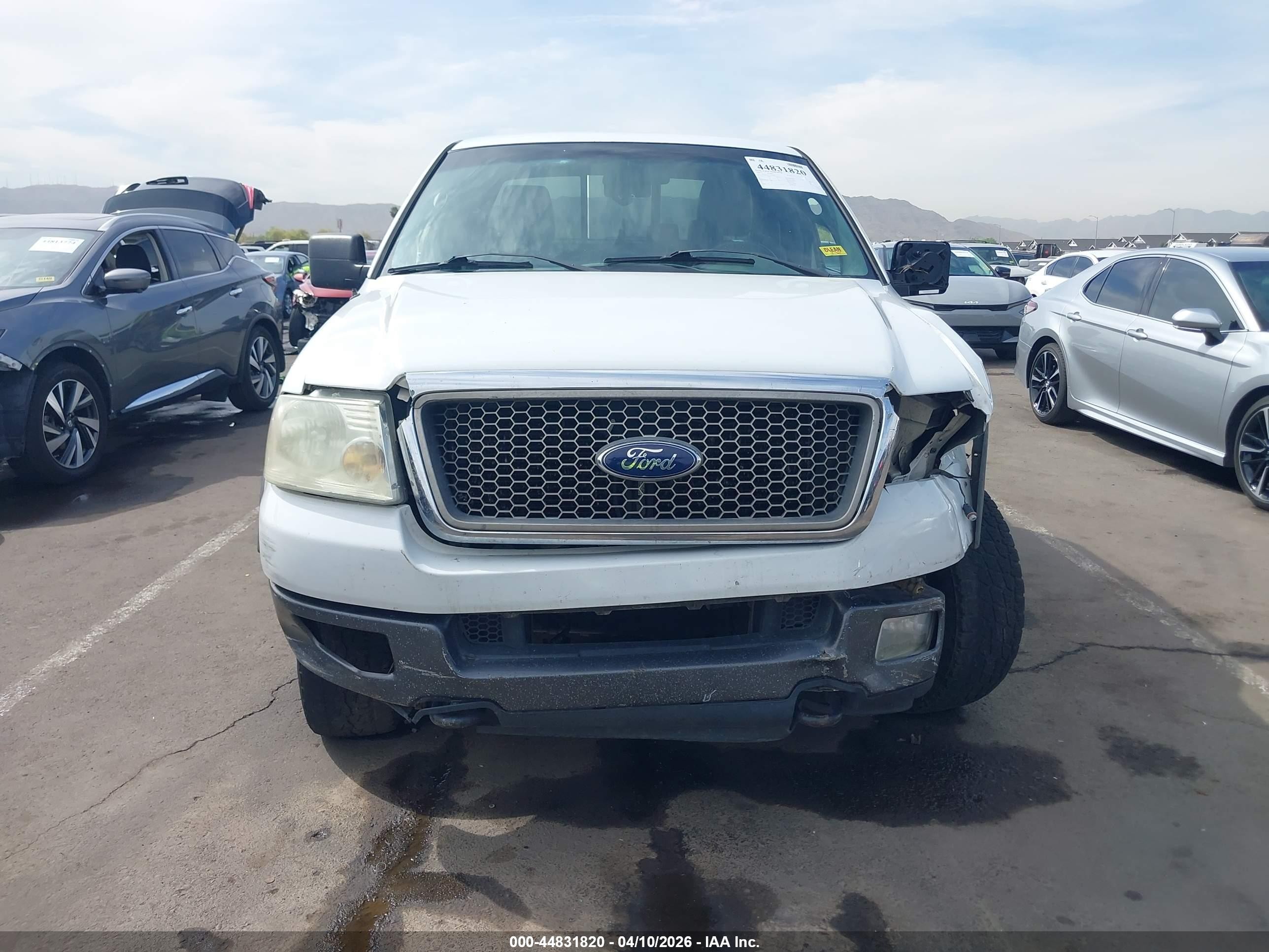 2004 Ford F150   White vin: 1FTPX14584NC28861