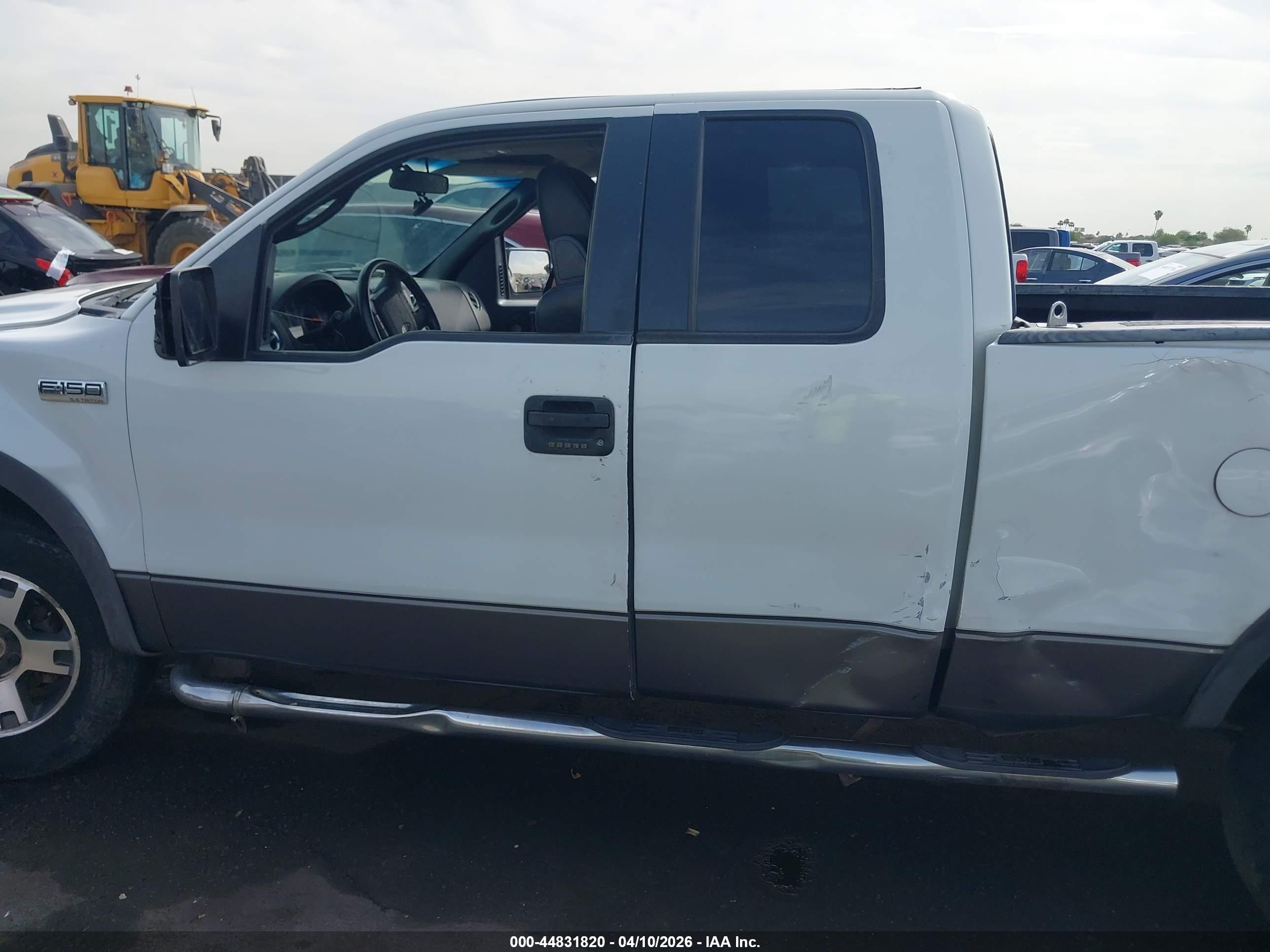 2004 Ford F150   White vin: 1FTPX14584NC28861