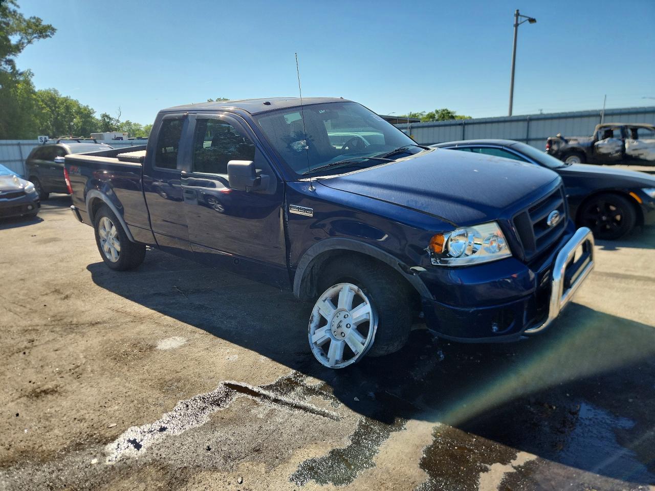 2007 Ford F150 Blue vin: 1FTPX14587NA77847