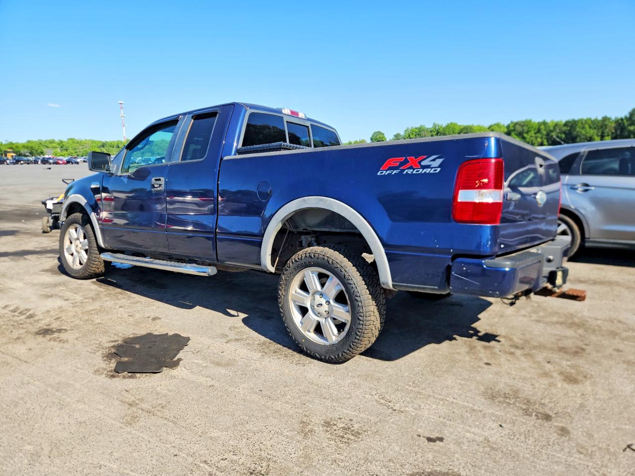 2007 Ford F150 Blue vin: 1FTPX14587NA77847