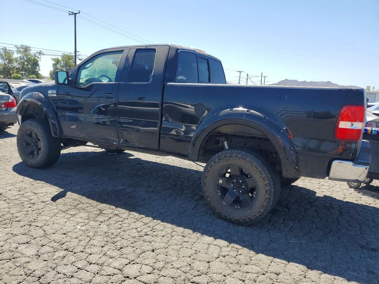 2005 Ford F150 Black vin: 1FTPX145X5FB10659