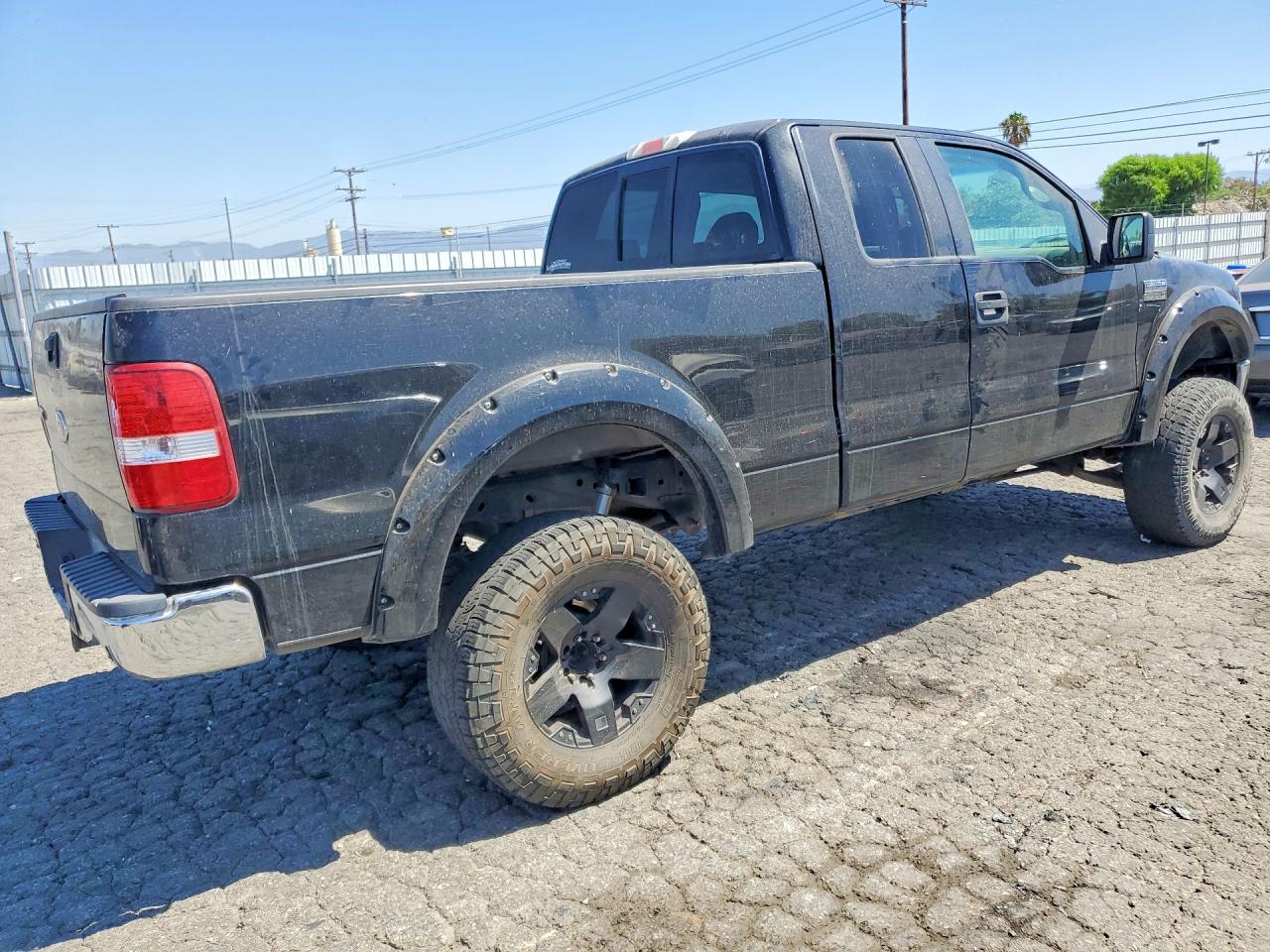 2005 Ford F150 Black vin: 1FTPX145X5FB10659