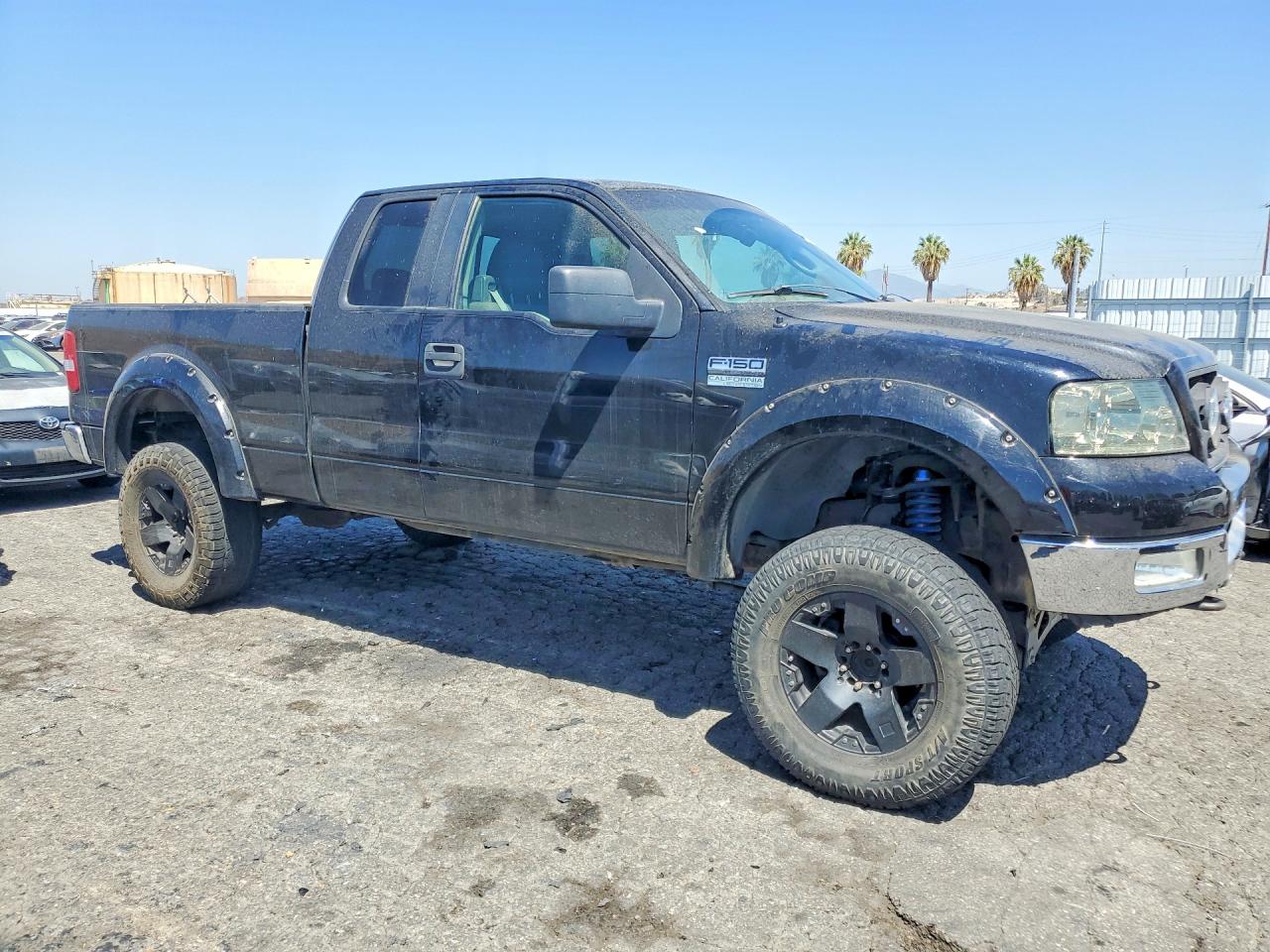 2005 Ford F150 Black vin: 1FTPX145X5FB10659