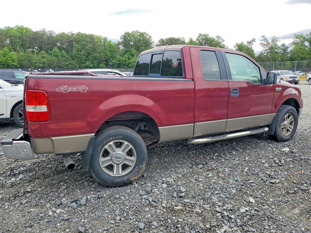 2005 Ford F150 Burgundy vin: 1FTPX145X5NB98599