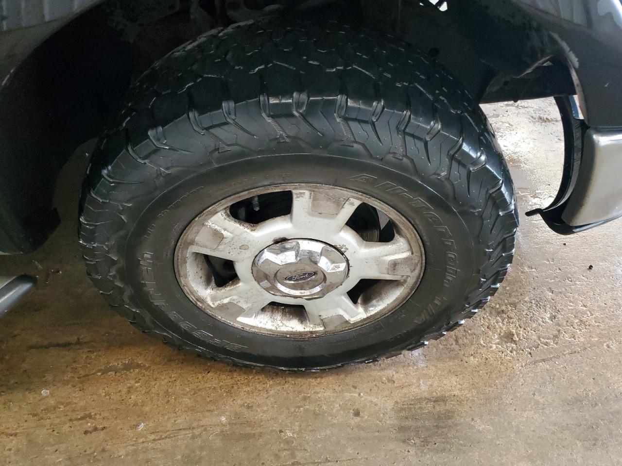 2008 Ford F150 Blue vin: 1FTPX14VX8FA78834 Damage: Right Front Wheel, Corrosion, > 12 Inches