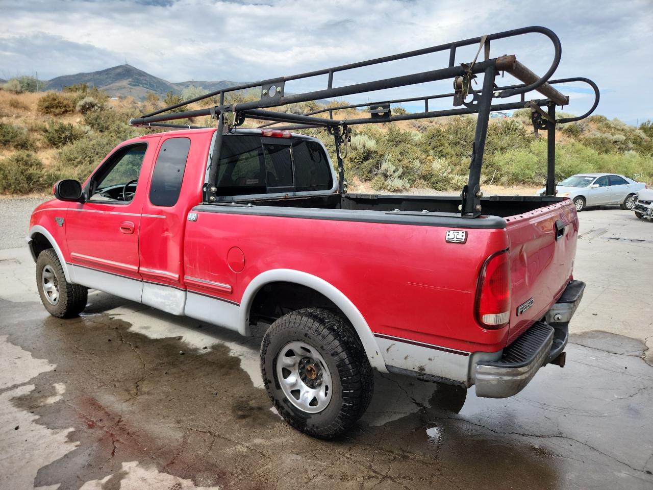 1998 Ford F250 Red vin: 1FTPX28L4WKA85426 Damage: Right Bed Side, Light Scratch, > 12 Inches