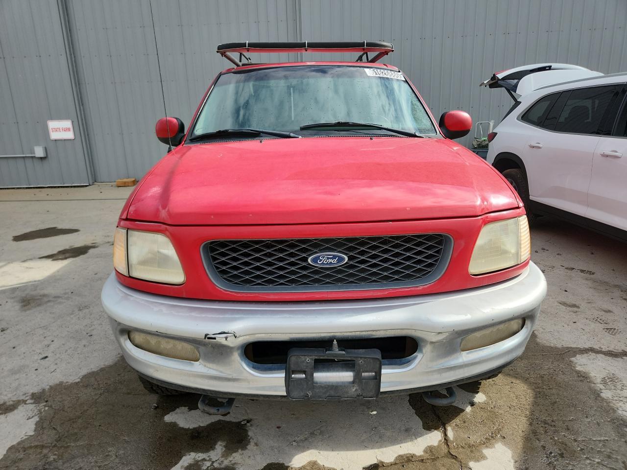 1998 Ford F250 Red vin: 1FTPX28L4WKA85426 Damage: Front Bumper Cover Upper, Oxidized, > 12 Inches
