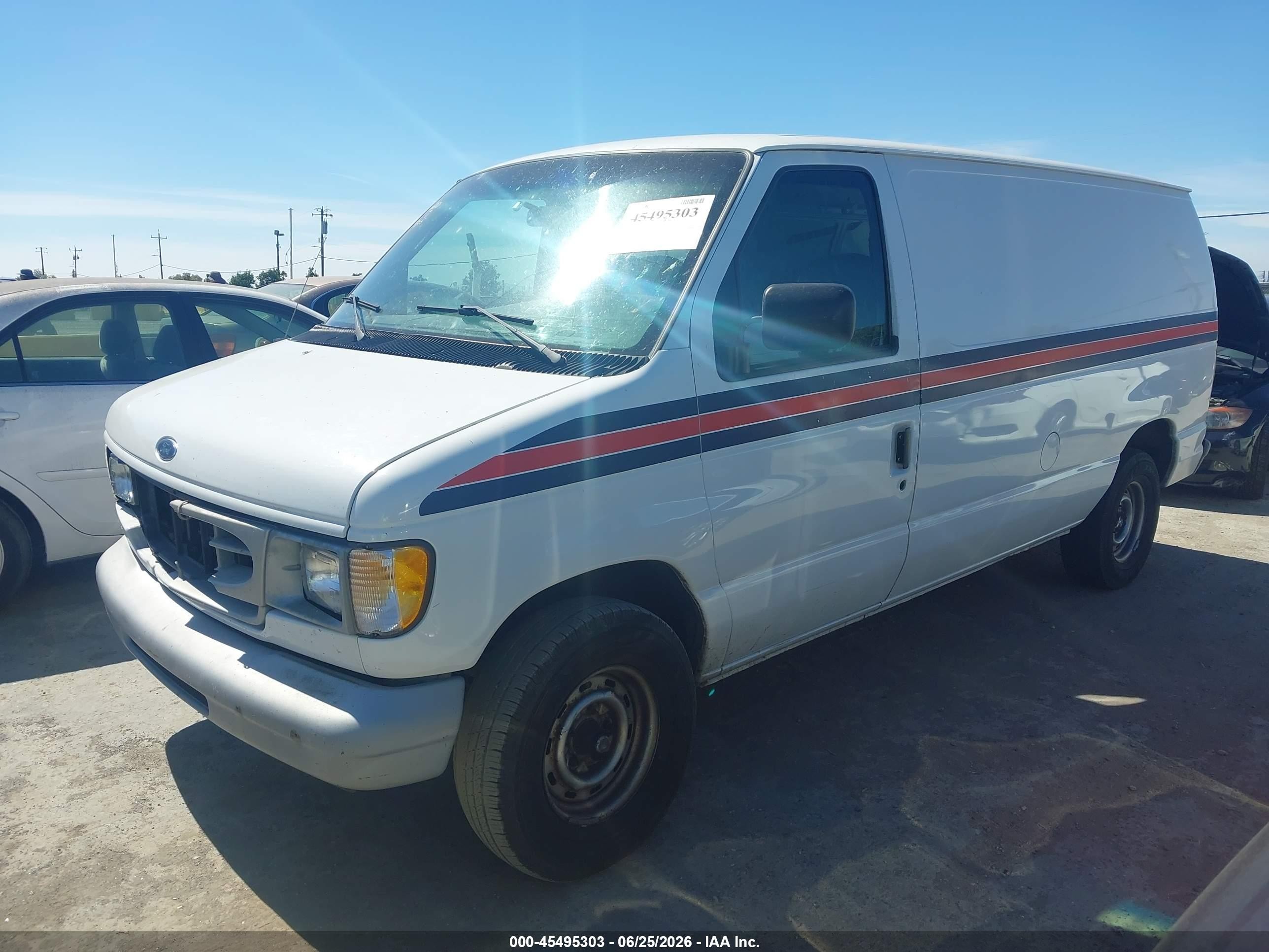 1999 Ford E-150 Commercial/recreational White vin: 1FTRE1423XHB55857