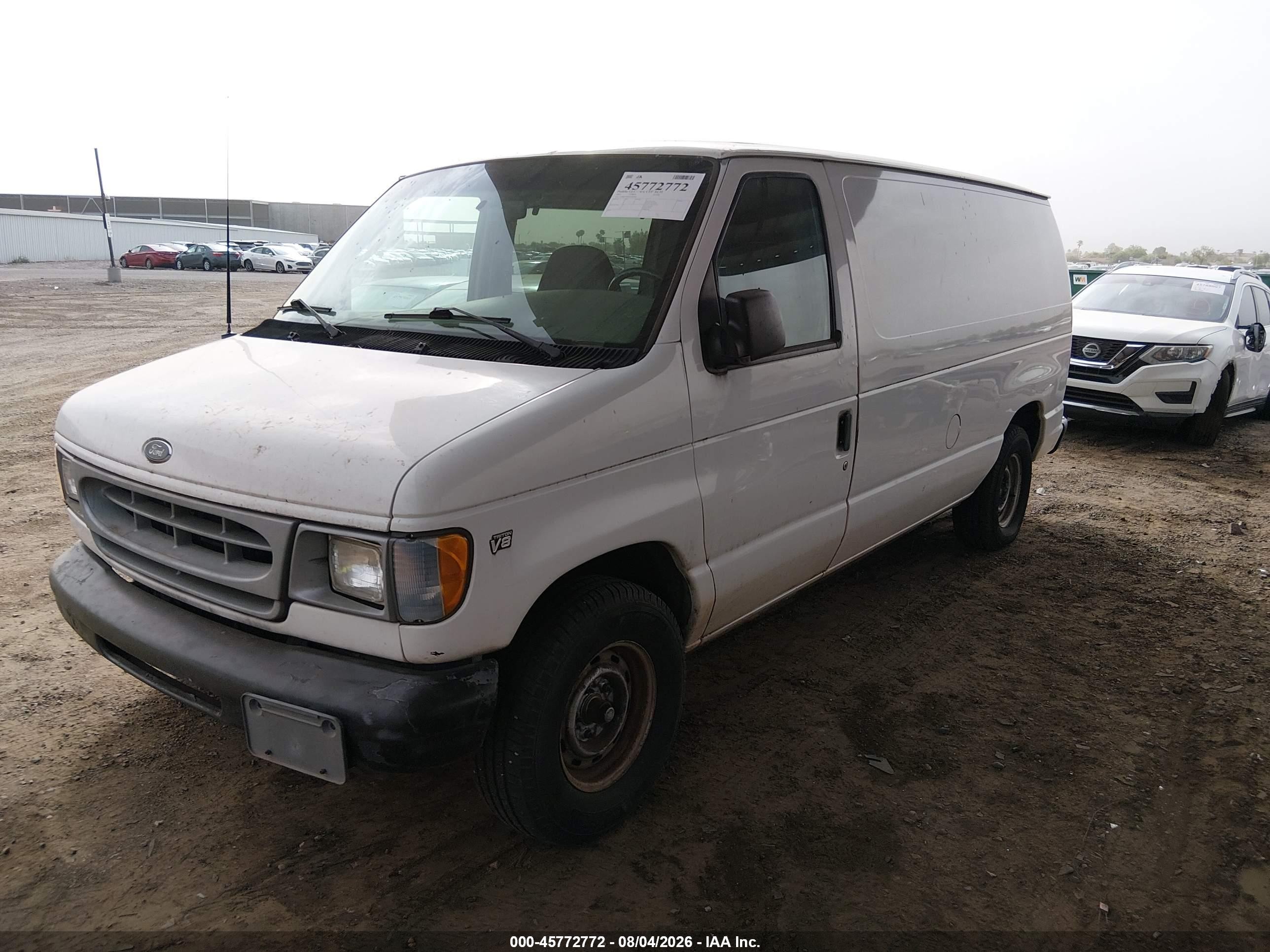 2001 Ford E-150 Commercial/recreational White vin: 1FTRE14W81HA89820