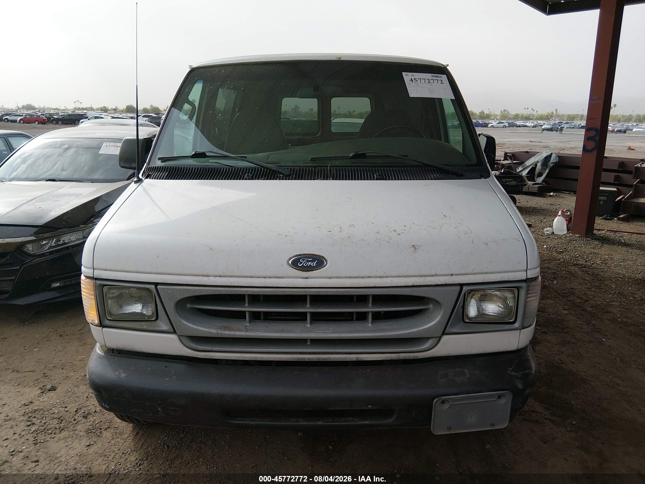 2001 Ford E-150 Commercial/recreational White vin: 1FTRE14W81HA89820