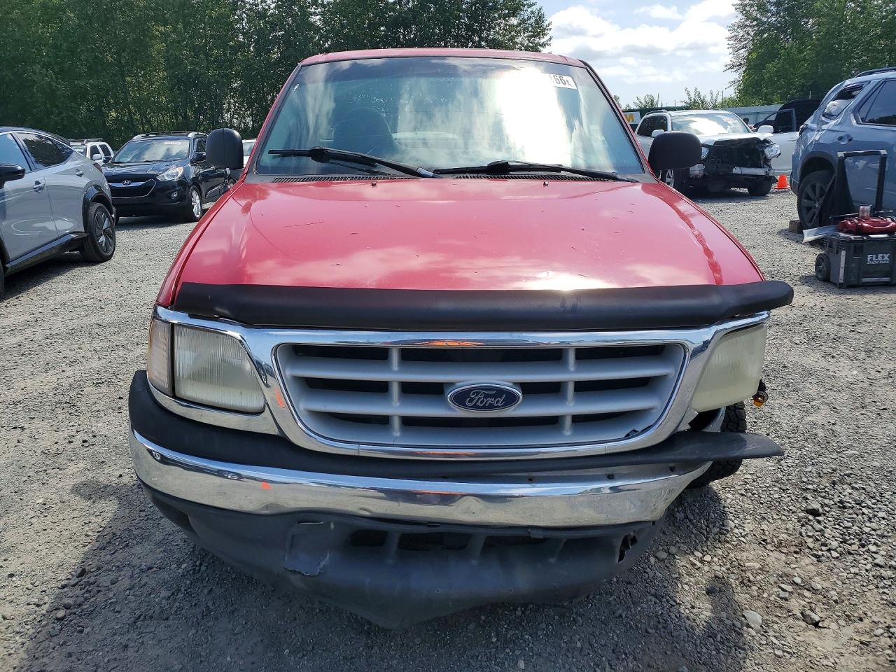 1999 Ford F150 Red vin: 1FTRF07W5XKB02229