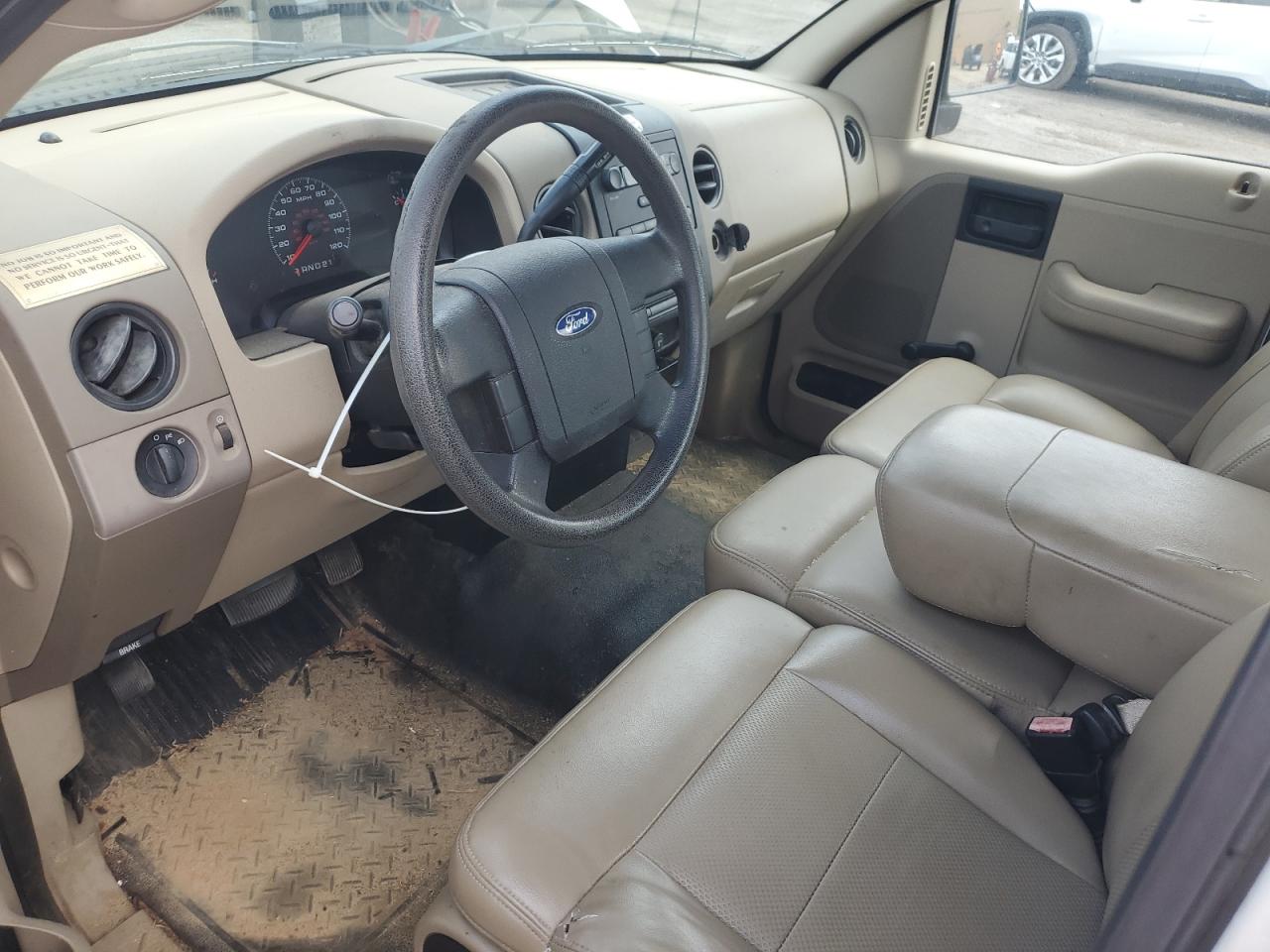 2008 Ford F150 White vin: 1FTRF12238KB62960 Damage: Front Center Armrest, Torn, 6 To 7 Inches
