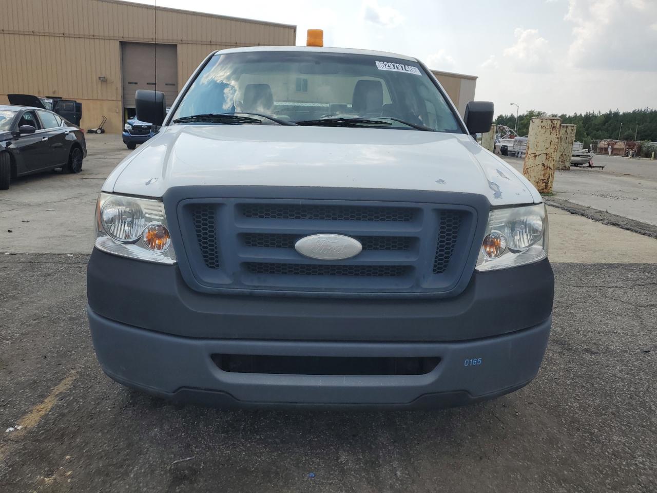 2008 Ford F150 White vin: 1FTRF12238KB62960 Damage: Front Emblem, Missing, Replacement Required