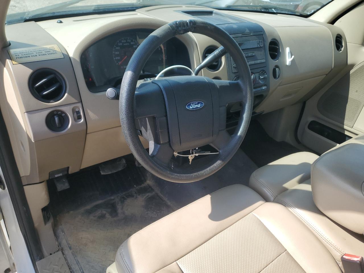 2008 Ford F150 White vin: 1FTRF12238KB62988 Damage: Steering Wheel, Worn, Replacement Required