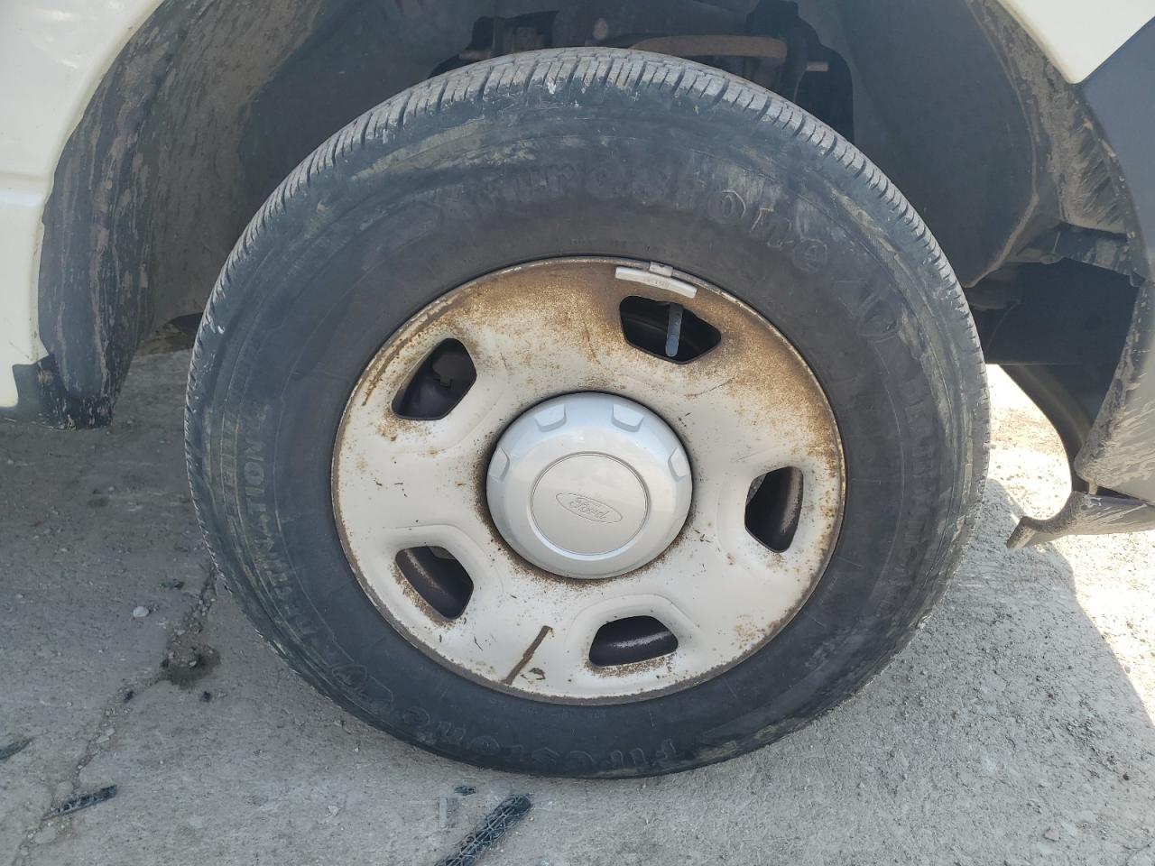 2008 Ford F150 White vin: 1FTRF12238KB62988 Damage: Right Front Wheel, Corrosion, > 12 Inches