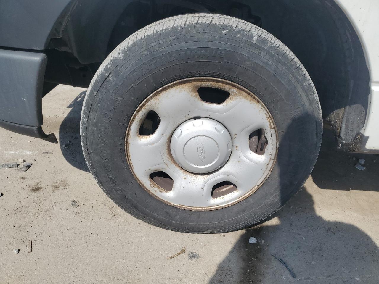 2008 Ford F150 White vin: 1FTRF12238KB62988 Damage: Left Front Wheel, Corrosion, > 12 Inches